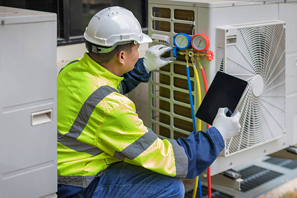 Professional Ductwork Repair technician working in Holden, MA